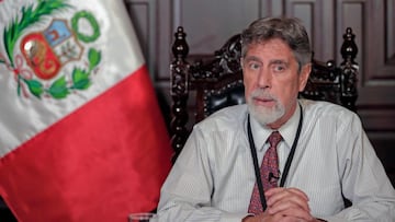Handout picture released by the Peruvian Presidency press office showing President Francisco Sagasti delivering a televised message to the nation regarding the new measures to control the spread of the COVID-19 coronavirus pandemic, the patients care, and vaccination of the population in Lima on January 26, 2021. - Peru registers 1.1 million confirmed cases and surpassed 40,000 deaths from covid-19 on Tuesday, at a time when the country has been going through a second wave of the pandemic since the beginning of January with an increase in deaths and infections that put hospitals on the brink of collapse. (Photo by Handout / Peruvian Presidency / AFP) / RESTRICTED TO EDITORIAL USE - MANDATORY CREDIT "AFP PHOTO / PERUVIAN PRESIDENCY / ALBERTO ORBEGOSO" - NO MARKETING NO ADVERTISING CAMPAIGNS - DISTRIBUTED AS A SERVICE TO CLIENTS