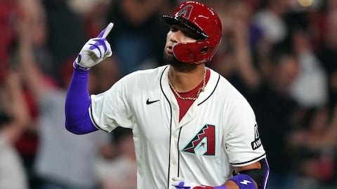 Mar 28, 2024; Phoenix, Arizona, USA;  Arizona Diamondbacks left fielder Lourdes Gurriel Jr. (12) runs the bases after hitting a two run home run against Colorado Rockies starting pitcher Kyle Freeland (not pictured) during the first inning at Chase Field. Mandatory Credit: Joe Camporeale-USA TODAY Sports