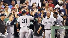 BOSTON, MA - JULY 28: Aaron Hicks #31 of the New York Yankees returns to the dugout after scoring on a fielding error by Jackie Bradley Jr. #19 of the Boston Red Sox (not pictured) in the sixth inning of a game at Fenway Park on July 28, 2019 in Boston, M