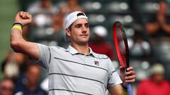 KEY BISCAYNE, FL - MARCH 28: John Isner of the United States celebrates to the crowd after his straight sets victory against Hyeon Chung of Korea in their quarter final match during the Miami Open Presented by Itau at Crandon Park Tennis Center on March 2