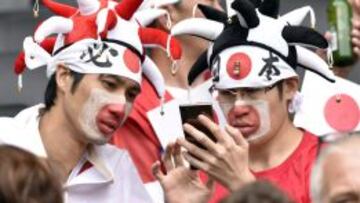 Aficionados japoneses en la grada durante el Japón-Tonga.