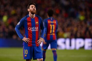 Barcelona's Argentinian forward Lionel Messi stands on the pitch during the UEFA Champions League quarter-final second leg football match FC Barcelona vs Juventus at the Camp Nou stadium in Barcelona on April 19, 2017