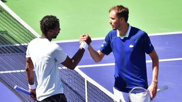 Daniil Medvedev, of Russia, congratulates Gael Monfils, of France, at the net following their Round 3 match at the Indian Wells tennis tournament in Indian Wells, California, on March 14, 2022. - Medvedev was sent crashing out of the ATP/WTA Indians Wells Masters in a stunning defeat to Monfils on Monday that ended the Russian&#039;s three-week reign as world number one. (Photo by Frederic J. BROWN / AFP)