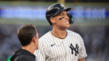 Jun 18, 2024; Bronx, New York, USA; New York Yankees center fielder Aaron Judge (99) reacts after being hit by a pitch during the third inning against the Baltimore Orioles at Yankee Stadium. Mandatory Credit: Vincent Carchietta-USA TODAY Sports