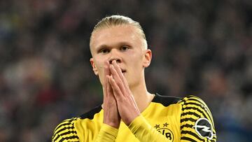 Dortmund's Norwegian forward Erling Braut Haaland reacts during the German first division Bundesliga football match FC Cologne v Borussia Dortmund in Cologne, western Germany, on March 20, 2022. (Photo by Ina FASSBENDER / AFP) / DFL REGULATIONS PROHIBIT ANY USE OF PHOTOGRAPHS AS IMAGE SEQUENCES AND/OR QUASI-VIDEO