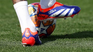 Soccer Football - Champions League - Final - Real Madrid Training - Ciudad Real Madrid, Valdebebas, Madrid, Spain - May 27, 2024 The tattoos and boots of Real Madrid's Eder Militao are seen during training REUTERS/Juan Medina