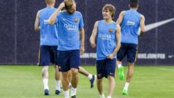 Halilovic, junto a su inseparable Rakitic.