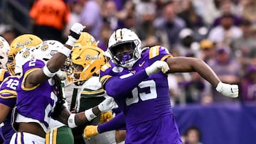 Dec 31, 2024; Houston, TX, USA; LSU Tigers defensive end Sai'vion Jones (35) rects during the first half against the Baylor Bears at NRG Stadium. Mandatory Credit: Maria Lysaker-Imagn Images