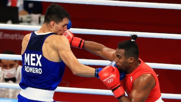 (L-R) Rogelio Torres of Mexico vs Arlen Lopez of Cuba during the Boxing fight, Quarterfinals of Mens Lightweight (75-81 kg), at the XXXII Olympic Games Tokyo 2020, at Arena de Kokugikan, on July 30 of 2021.
<br><br>
(I-D) Rogelio Torres of Mexico vs Arlen Lopez de Cuba durante la pelea de Boxeo, Cuartos de Final de Peso ligero masculino (75-81 kg) , en los XXXII Juegos Olimpicos de Tokio 2020, en Arena de Kokugikan, el 30 de julio de 2021.