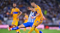 German Berterame (L) of Monterrey fights for the ball with Jesus Angulo (R) of Tigres during the 15th round match between Monterrey an Tigres UANL as part of the Torneo Clausura 2024 Liga BBVA MX at BBVA Bancomer Stadium on April 13, 2024 in Monterrey, Nuevo Leon, Mexico.