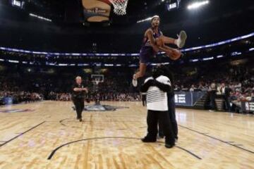 Feb 18, 2017; New Orleans, LA, USA; Phoenix Suns forward Derrick Jones Jr. (10) competes in the slam dunk contest during NBA All-Star Saturday Night at Smoothie King Center. Mandatory Credit: Ronald Martinez-USA TODAY Sports