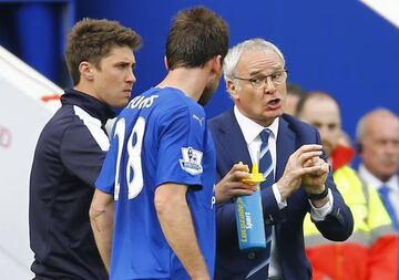 Leicester City boss Claudio Ranieri issues instructions to Christian Fuchs.