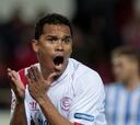 Sevilla, con Carlos Bacca, visita esta tarde al Espanyol