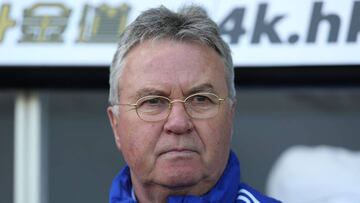 (FILES) This file picture taken on April 9, 2016 shows then Chelsea's Dutch interim manager Guus Hiddink watching his players warm up ahead of the English Premier League football match between Swansea City and Chelsea at The Liberty Stadium in Swanse