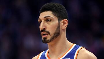 (FILES) In this file photo taken on January 1, 2018, Enes Kanter of the New York Knicks plays the Denver Nuggets in Denver, Colorado. - Kanter, staying home from an NBA game JUanuary 17, 2019, in London over safety fears, ripped Turkey President Recep Tayyip Erdogan in a Washington Post column on January 15. Kanter, who says he receives death threats for his complaints against Erdogan, said he refused to join the Knicks on the trip to Britain for a game against the Washington Wizards because he worried Erdogan might have him kidnapped or killed. (Photo by MATTHEW STOCKMAN / GETTY IMAGES NORTH AMERICA / AFP)