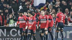 Lille's Canadian forward Jonathan David (L) celebrates with teammates after scoring his first goal during the French L1 football match between Lille LOSC and Olympique Lyonnais (OL) at Stade Pierre-Mauroy in Villeneuve-d'Ascq, northern France, on March 10, 2023. (Photo by Sameer Al-DOUMY / AFP)