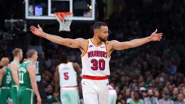 Golden State Warriors guard Stephen Curry (30) reacts during the first half against the Boston Celtics at TD Garden.
