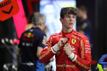 Ferrari's British reserve driver Oliver Bearman winds stands the garage after the qualifying session of the Saudi Arabian Formula One Grand Prix at the Jeddah Corniche Circuit in Jeddah on March 8, 2024. (Photo by Giuseppe CACACE / POOL / AFP)