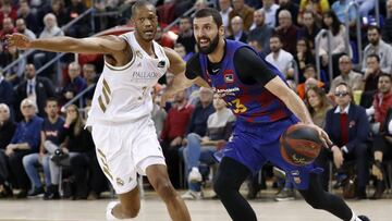 GRAF5185. BARCELONA, 29/12/2019.- El ala pivot del Barcelona Nikola Mirotic (d) intenta avanzar con la pelota ante la oposición de Anthony Randolph (i), del Real Madrid , durante el partido de la Liga ACB jugado esta tarde en el Palau Blaugrana de Barcelona . EFE/Andreu Dalmau