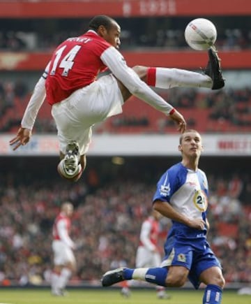 Henry in action against Blackburn.