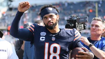 CHICAGO, ILLINOIS - SEPTEMBER 08: Caleb Williams #18 of the Chicago Bears celebrates after the game against the Tennessee Titans at Soldier Field on September 08, 2024 in Chicago, Illinois. The Bears defeated the Titans 24-17. Quinn Harris/Getty Images/AFP (Photo by Quinn Harris / GETTY IMAGES NORTH AMERICA / Getty Images via AFP)