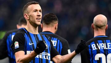 Inter Milan&#039;s Croatian forward Ivan Perisic celebrates after scoring during the Italian Serie A football match Inter Milan vs Chievo on December 3, 2017 at the San Siro stadium in Milan.  / AFP PHOTO / MIGUEL MEDINA