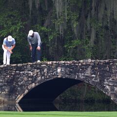 Water hazard: Golfers in Australia play alongside a shark-infested lake