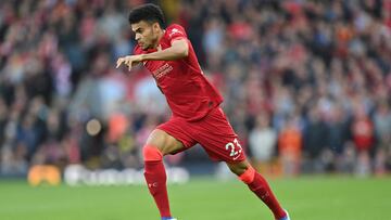 Liverpool's Colombian midfielder Luis Diaz runs with the ball during the English Premier League football match between Liverpool and Tottenham Hotspur at Anfield in Liverpool, north west England on May 7, 2022. (Photo by Paul ELLIS / AFP) / RESTRICTED TO EDITORIAL USE. No use with unauthorized audio, video, data, fixture lists, club/league logos or 'live' services. Online in-match use limited to 120 images. An additional 40 images may be used in extra time. No video emulation. Social media in-match use limited to 120 images. An additional 40 images may be used in extra time. No use in betting publications, games or single club/league/player publications. /