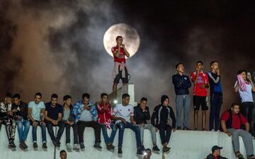 Wydad Casablanca's supporters cheer for their team before the start of the CAF Champions League final football match between Egypt's Al-Ahly and Morocco's Wydad Casablanca on November 4, 2017, at Mohamed V Stadium in Casablanca.