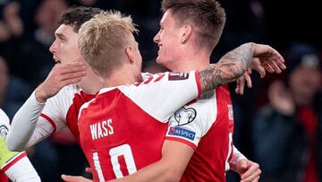 Soccer Football - World Cup - UEFA Qualifiers - Group F - Denmark v Austria - Parken Stadium, Copenhagen, Denmark - October 12, 2021 Denmarks Joakim Maehle celebrates scoring their first goal with Simon Kjaer, Andreas Christensen and Daniel Wass Liselotte