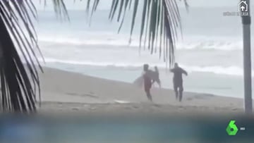 Hay que cosas que no se pueden concebir: cómo sacó un policía a un surfista de la playa