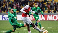 Vorskla&#039;s Kosovo defender Ardin Dallku (L) vies for the ball with Arsenal&#039;s English striker Eddie Nketiah (C) during the UEFA Europa League Group E football match between Vorskla and Arsenal at the Olympiyski Stadium, in Kiev, on November 29, 20