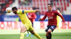 PAMPLONA, SPAIN - MARCH 05: Kike Garcia of CA Osasuna duels for the ball with Raul Albiol of Villarreal CF during the LaLiga Santander match between CA Osasuna and Villarreal CF at Estadio El Sadar on March 05, 2022 in Pamplona, Spain. (Photo by Juan Manu