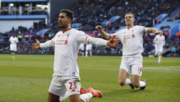 Emre Can celebrates scoring the third goal of six for Liverpool against Aston Villa