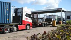 Lorries wait to refill at the Watling Street truck stop amid the fuel shortage in Flamstead, St Albans, Britain, September 29, 2021.  REUTERS/Peter Cziborra