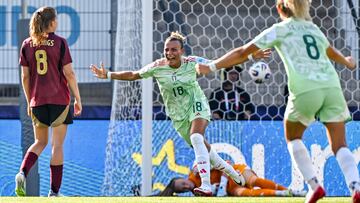 Italy's midfielder #18 Arianna Caruso reacts after scoring the first goal of the match during the UEFA Women's Euro 2025 Group B football match between Belgium and Italy at the Stade de Tourbillon in Sion, on July 3, 2025. (Photo by Fabrice COFFRINI / AFP)