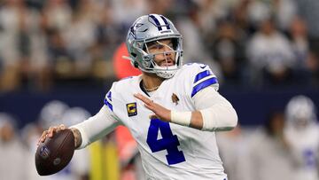 ARLINGTON, TEXAS - JANUARY 14: Dak Prescott #4 of the Dallas Cowboys drops back to pass during the first quarter of the NFC Wild Card Playoff game against the Green Bay Packers at AT&T Stadium on January 14, 2024 in Arlington, Texas.   Ron Jenkins/Getty Images/AFP (Photo by Ron Jenkins / GETTY IMAGES NORTH AMERICA / Getty Images via AFP)