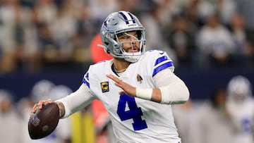 ARLINGTON, TEXAS - JANUARY 14: Dak Prescott #4 of the Dallas Cowboys drops back to pass during the first quarter of the NFC Wild Card Playoff game against the Green Bay Packers at AT&T Stadium on January 14, 2024 in Arlington, Texas.   Ron Jenkins/Getty Images/AFP (Photo by Ron Jenkins / GETTY IMAGES NORTH AMERICA / Getty Images via AFP)