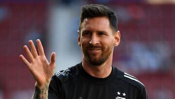 Argentina's Lionel Messi gestures before the start of the international friendly football match between Argentina and Estonia at El Sadar stadium in Pamplona on June 5, 2022. (Photo by ANDER GILLENEA / AFP)