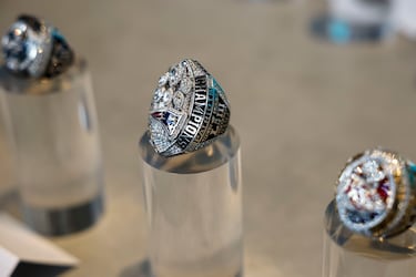 View of the championship rings that are part of an exhibition showcasing items from all 32 NFL teams.