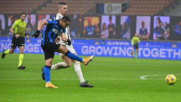 Inter Milan's Chilean forward Alexis Sanchez shoots on goal during the Italian Cup quarter final first leg football match beetween Inter Milan and Juventus Turin on February 2, 2021 at the San Siro stadium in Milan. (Photo by MIGUEL MEDINA / AFP)