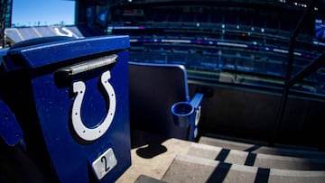 (FILES) In this file photo taken on September 20, 2020, sunlight highlights an Indianapolis Colts logo on a seat at Lucas Oil Stadium before the game between the Indianapolis Colts and the Minnesota Vikings in Indianapolis, Indiana. - The Indianapolis Col