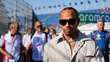 Mercedes' British driver Lewis Hamilton arrives in the paddock of the Zandvoort circuit before the third free practice session ahead of the Dutch Formula One Grand Prix, on September 3, 2022. (Photo by Kenzo TRIBOUILLARD / AFP) (Photo by KENZO TRIBOUILLARD/AFP via Getty Images)