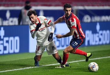 Munir El Haddadi y Mario Hermoso.