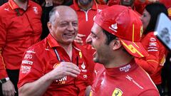 Formula One F1 - Australian Grand Prix - Melbourne Grand Prix Circuit, Melbourne, Australia - March 24, 2024 Ferrari's Carlos Sainz Jr. celebrates after winning the Australian Grand Prix along with team principal Frederic Vasseur REUTERS/Jaimi Joy