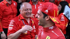 Formula One F1 - Australian Grand Prix - Melbourne Grand Prix Circuit, Melbourne, Australia - March 24, 2024 Ferrari's Carlos Sainz Jr. celebrates after winning the Australian Grand Prix along with team principal Frederic Vasseur REUTERS/Jaimi Joy