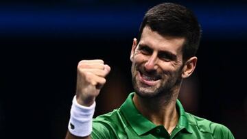 Serbia's Novak Djokovic celebrates after winning his first round-robin match against Greece's Stefanos Tsitsipas at the ATP Finals tennis tournament on November 14, 2022 in Turin. (Photo by Marco BERTORELLO / AFP) (Photo by MARCO BERTORELLO/AFP via Getty Images)