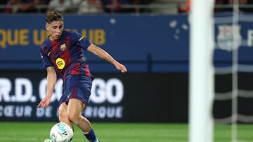 Barcelona's Spanish midfielder #16 Fermin Lopez scores his team's first goal during the Spanish league football match between FC Barcelona and Valencia CF at Johan Cruyff Stadium in Barcelona, on September 14, 2025. (Photo by Lluis GENE / AFP)
