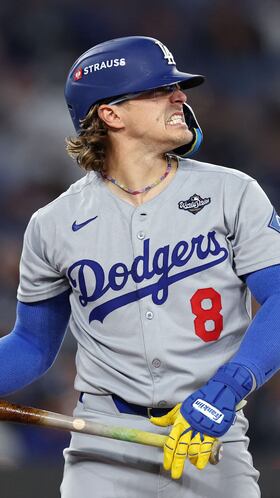 TORONTO, ONTARIO - OCTOBER 24: Enrique Hernandez #8 of the Los Angeles Dodgers reacts after a strike during a sixth inning at-bat against the Toronto Blue Jays in game one of the 2025 World Series at Rogers Center on October 24, 2025 in Toronto, Ontario. Patrick Smith/Getty Images/AFP (Photo by Patrick Smith / GETTY IMAGES NORTH AMERICA / Getty Images via AFP)