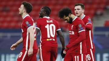 Soccer Football - Champions League - Round of 16 Second Leg - Liverpool v RB Leipzig - Puskas Arena, Budapest, Hungary - March 10, 2021 Liverpool&#039;s Mohamed Salah celebrates scoring their first goal with teammates REUTERS/Bernadett Szabo